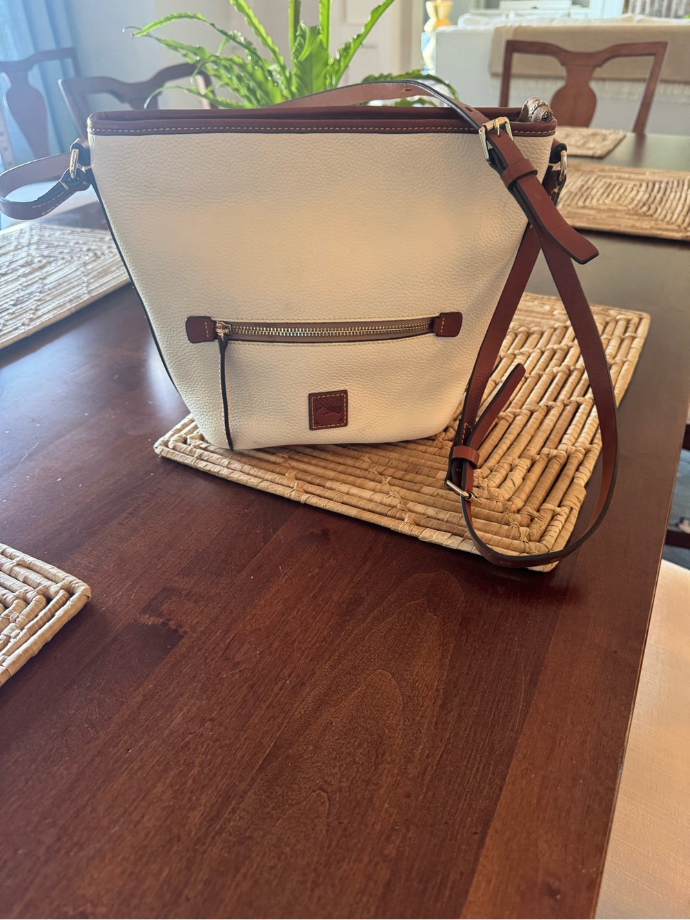Dooney and Bourke white leather crossbody bag like new
